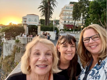 Medicare Open Enrollment & Team Spotlight 7 Tina Jones and family enjoying a sunset in Italy — a CSG Insurance Medicare Open Enrollment team member who helps clients choose the right Medicare Advantage Plan.